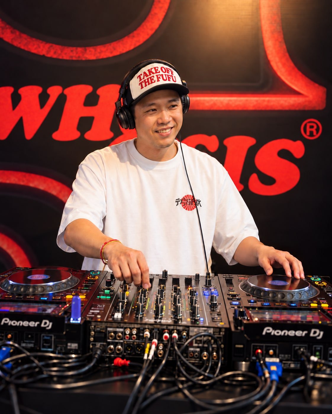 Concept full portrait of MORI KAZE behind a DJ setup